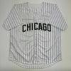 Autographed/Signed Paul Konerko Chicago Pinstripe Baseball Jersey JSA COA