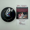 Autographed/Signed Artemi Panarin New York Rangers Logo Hockey Puck JSA COA