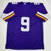Autographed/Signed J.J. JJ McCarthy Minnesota Purple Football Jersey Beckett BAS COA