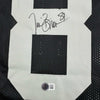 Framed Autographed/Signed Tim Brown 35x39 Oakland Black Football Jersey Beckett BAS COA