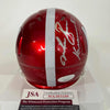 Autographed/Signed Johnny Rodgers, Mike Rozier, Eric Crouch Nebraska Cornhuskers Heisman Trophy Winners Red Flash Alternate Mini College Football Helmet JSA COA
