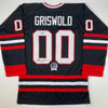 Autographed/Signed Chevy Chase Clark Griswold Christmas Vacation Movie Chicago Black Hockey Jersey Beckett BAS COA
