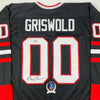 Autographed/Signed Chevy Chase Clark Griswold Christmas Vacation Movie Chicago Black Hockey Jersey Beckett BAS COA