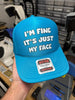 I'm Fine It's Just My Face Trucker Hat by Luckless Outfitters