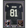 Framed Autographed/Signed Tim Brown 35x39 Oakland Black Football Jersey Beckett BAS COA