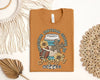 Surviving Football Season on Jesus & Coffee Graphic Tee by Anchored Grace Boutique