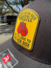 Love To See Her Box Canvas Patch Trucker by Luckless Outfitters