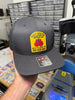 Love To See Her Box Canvas Patch Trucker by Luckless Outfitters