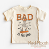 Bad To The Bone Skater Shirt - Halloween Shirt by Madi Moosh