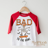 Bad To The Bone Skater Shirt - Halloween Shirt by Madi Moosh