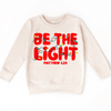 Be The Light Christmas Shirt - Christian Tee by Madi Moosh