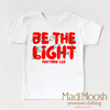 Be The Light Christmas Shirt - Christian Tee by Madi Moosh