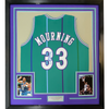 Framed Autographed/Signed Alonzo Mourning 35x39 Charlotte Teal Basketball Jersey JSA COA