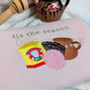 Pink Concha Embroidered Holiday Sweatshirt by Dog Mom Hat