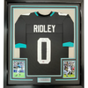 Framed Autographed/Signed Calvin Ridley 35x39 Jacksonville Black Football Jersey Beckett BAS COA