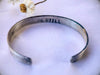 Sterling Silver Stamped Cuff Bracelet | BE STILL Rectangle Cuff | Stand Collection by mend metalworks
