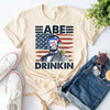 Abe Drinkin 4th of July Shirt – Abraham Lincoln Patriotic Drinking Tee by Adorb Custom Tees