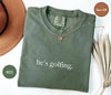 He's Golfing Shirt - Golfer Wife Tee, Comfort Colors Crewneck for Men & Women by Dog Mom Hat