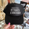 Parenting: It Takes a Vineyard Trucker Hat | Funny Mom Life Hat by Hey Jude Graphic Tees