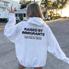 "Raised By Immigrants" Hoodie – Hispanic Heritage Pride by Dog Mom Hat