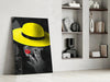 Yellow Hat Glass Wall Art by Insigneart USA