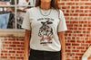Check Your Ego Amigo Cowboy Graphic Tee by Wild Junkie