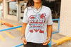 Cowboy Motel Raw Cut V-neck Graphic Tee by Wild Junkie