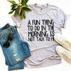 A Fun Thing To Do In The Morning T-shirt by T-Shirt Crazed