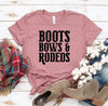 Boots Bows And Rodeos T-shirt by T-Shirt Crazed