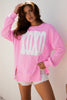 Pink Bow Sequin XOXO Letter Graphic Exposed Seam Baggy Sweatshirt by Wild and Free Boutique