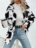 Trendy Black White Cozy Cow Print Collared Neck Button Up Fuzzy Jacket Modern & Warm Outerwear by Stevvex