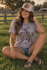 Halloween Cowgirl Bucking Horse Graphic Tee by Wild Junkie