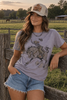 Halloween Cowgirl Bucking Horse Graphic Tee by Wild Junkie