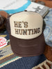 He's Hunting Trucker Hat by Wild Junkie