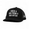 I Need a Hug from a Bad Bitch Snapback Hat by The Mad Hatter Company