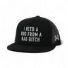 I Need a Hug from a Bad Bitch Snapback Hat by The Mad Hatter Company
