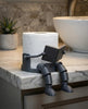 3D Printed Robot Toilet Paper Holder | Articulated Reading Man Bathroom Decor by Everyday Customs Co.