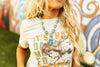 It's That Damned Rodeo Graphic Tee by Wild Junkie