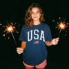 USA Varsity Graphic Tee – White Letter Patriotic Shirt by Hey Jude Graphic Tees