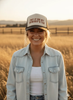 Put It On My Cowboy's Tab Trucker Hat by Wild Junkie
