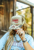 Raisin' Hell Green Camo Trucker Hat by Wild Junkie
