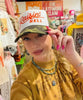Raisin' Hell Trucker Hat by Wild Junkie