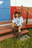 Saddle Oiled Raw Hem V-Neck Graphic by Wild Junkie
