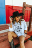 Saddle Oiled Raw Hem V-Neck Graphic by Wild Junkie