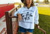 Saddle Oiled Raw Hem V-Neck Graphic by Wild Junkie