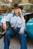 Saddle Oiled Raw Hem V-Neck Graphic by Wild Junkie