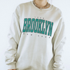 Brooklyn Crewneck Sweatshirt by Hey Jude Graphic Tees