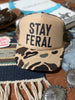 Stay Feral Camo Trucker Hat by Wild Junkie