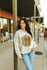 Western Saddle Graphic Sweatshirt by Wild Junkie
